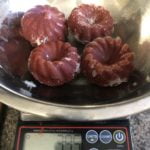 weighing tomato puree